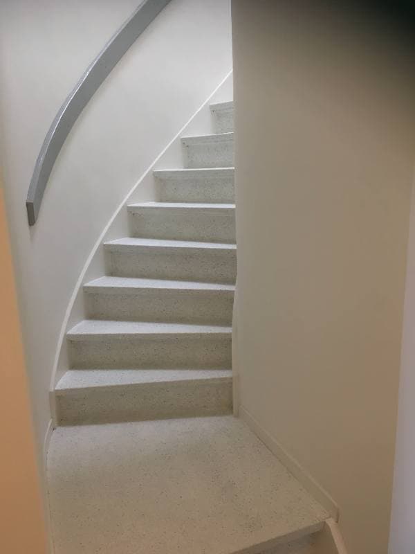Wooden staircase renovation with Sandy Glow terrazzo structure in Gouda