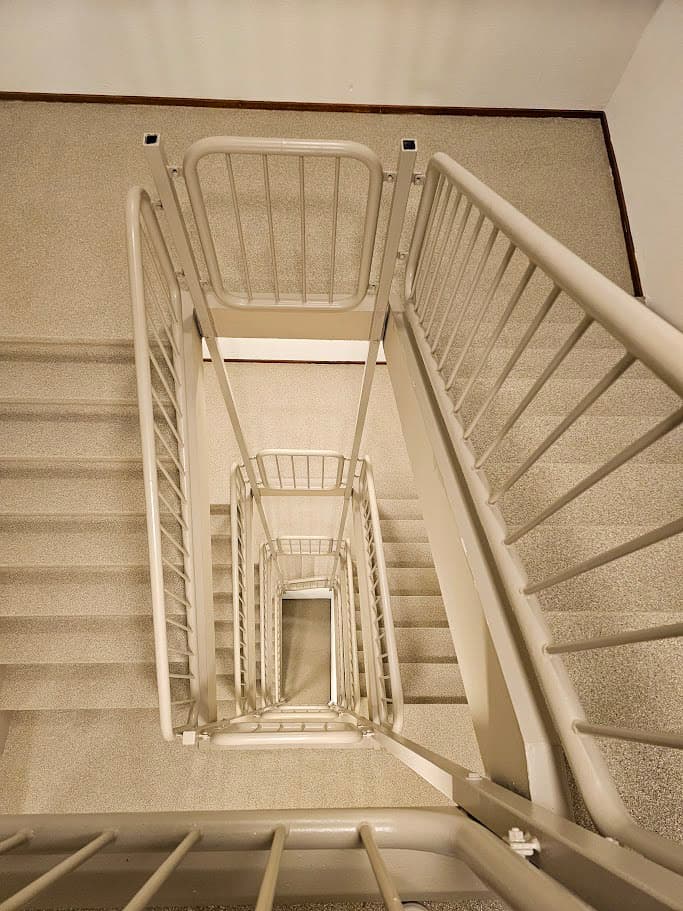 EverStep Solid stair renovation — stairwell fully clad from tread to riser