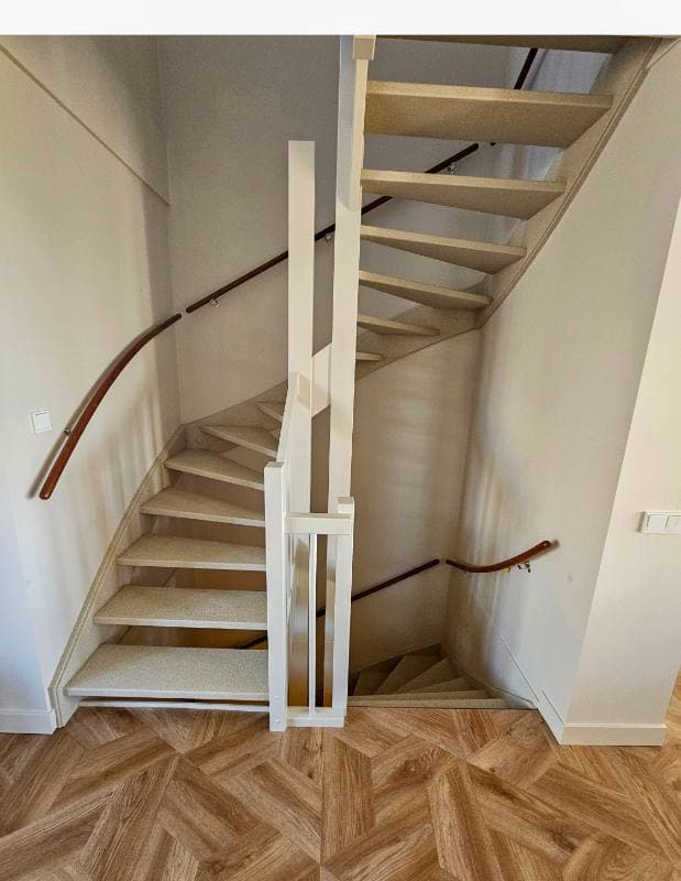 New-build wooden staircase with DesertBeige stone structure in Rotterdam