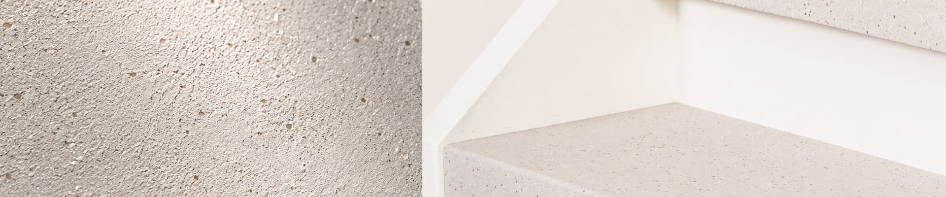 Raking light across a real mineral stone composite stair surface as a macro showing depth, grain and irregularity, with the same light treads photorealistic in context on the right