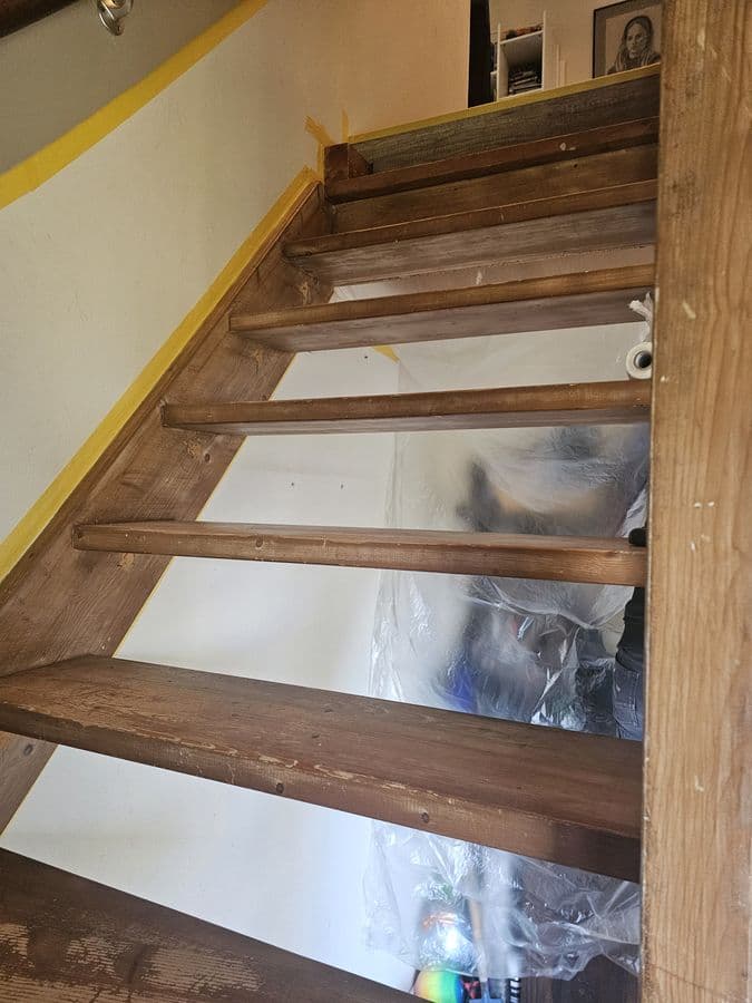 Old pine stair with sagging treads and support battens