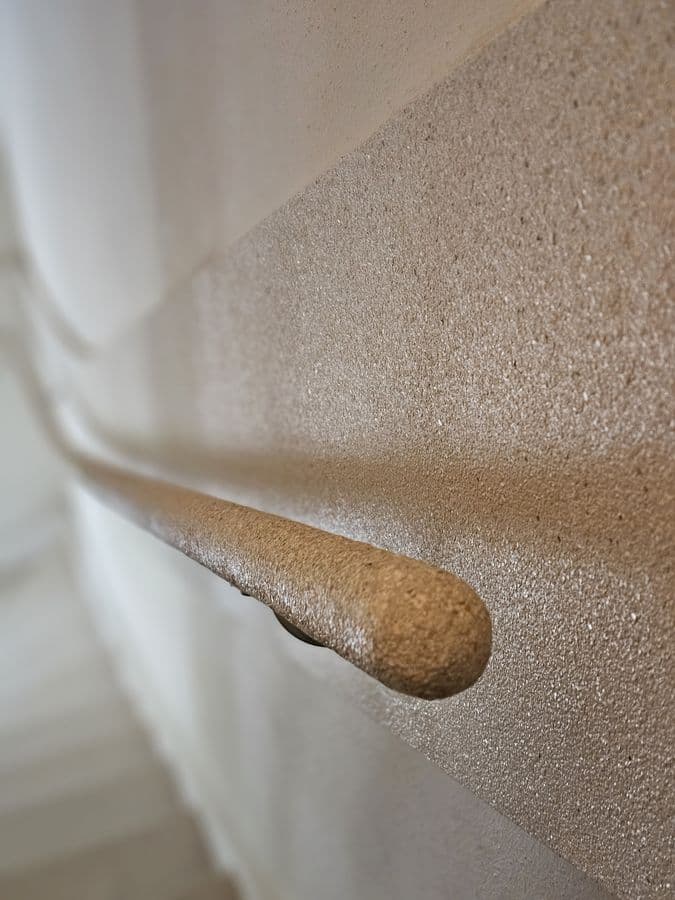 Signature CrystalSand — finished handrail detail